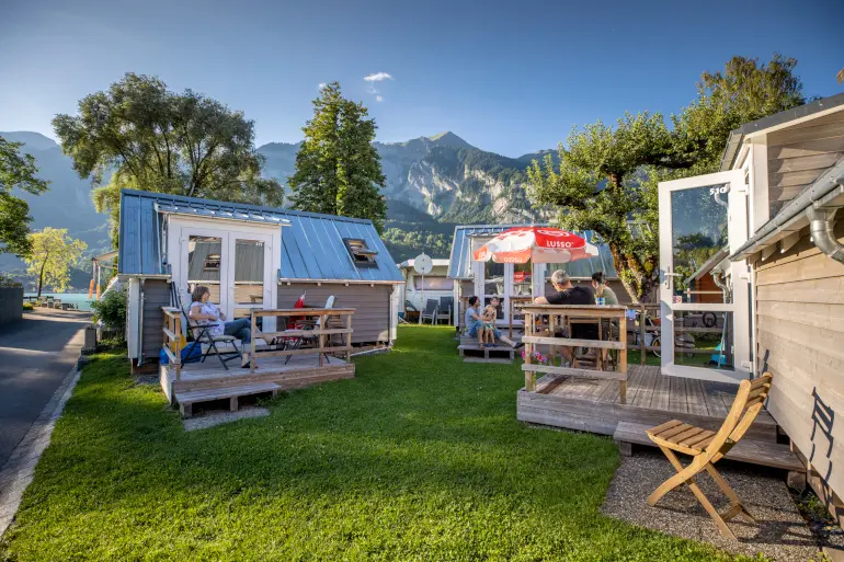 Practical, family-friendly cabins for rent at Camping Aaregg on Lake Brienz, Switzerland.