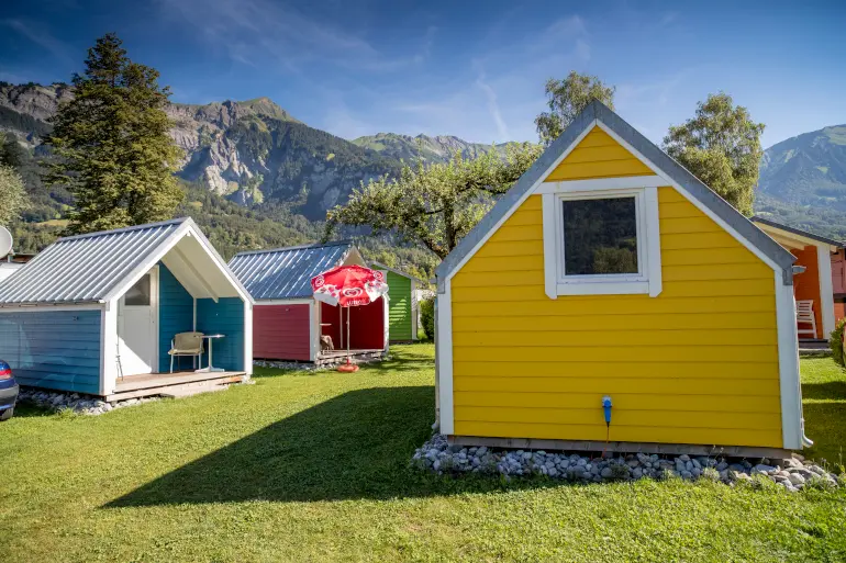 Functional sleeping cabins at Camping Aaregg on Lake Brienz, Switzerland